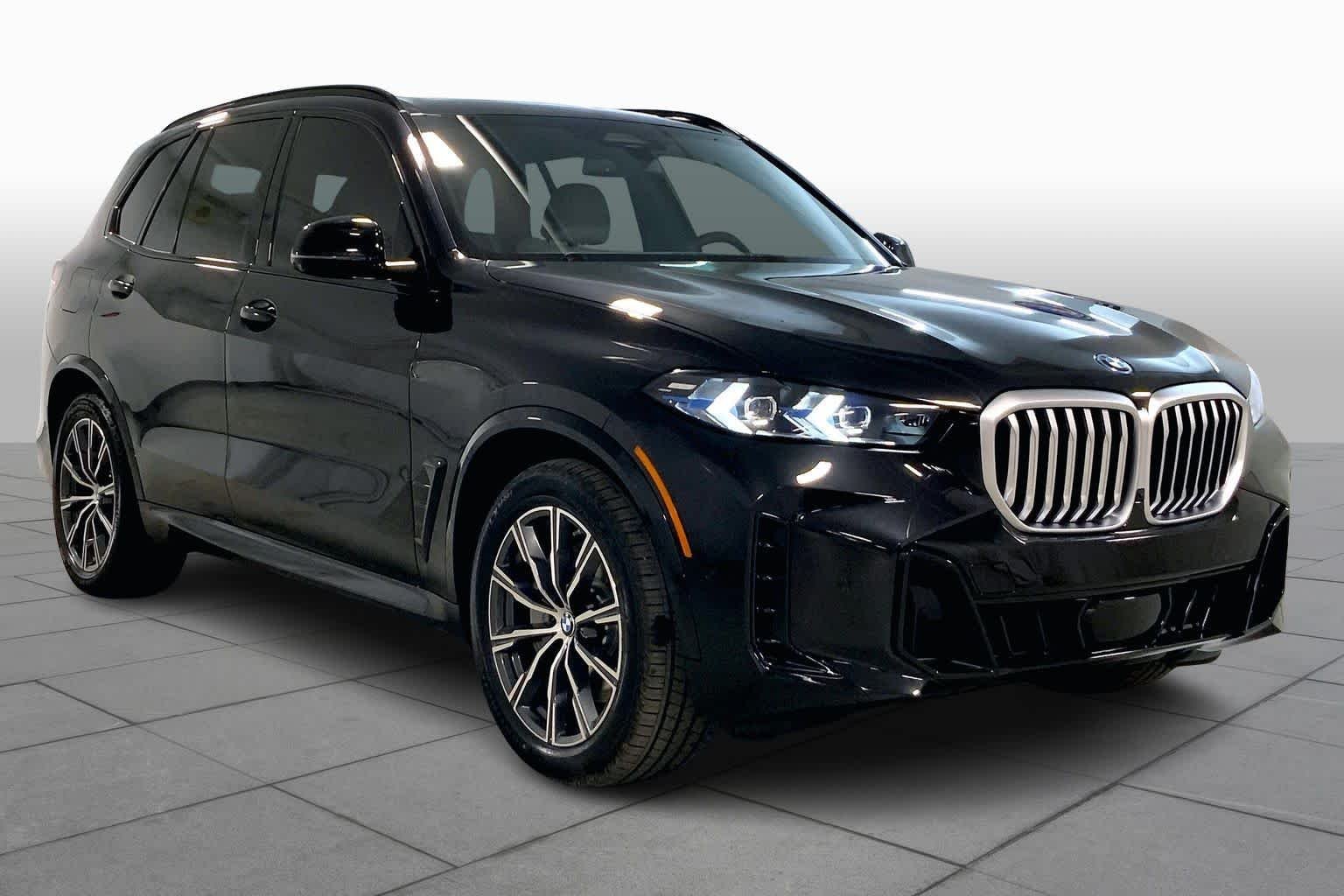 New 2026 Black Sapphire Metallic BMW xDrive50e image 2