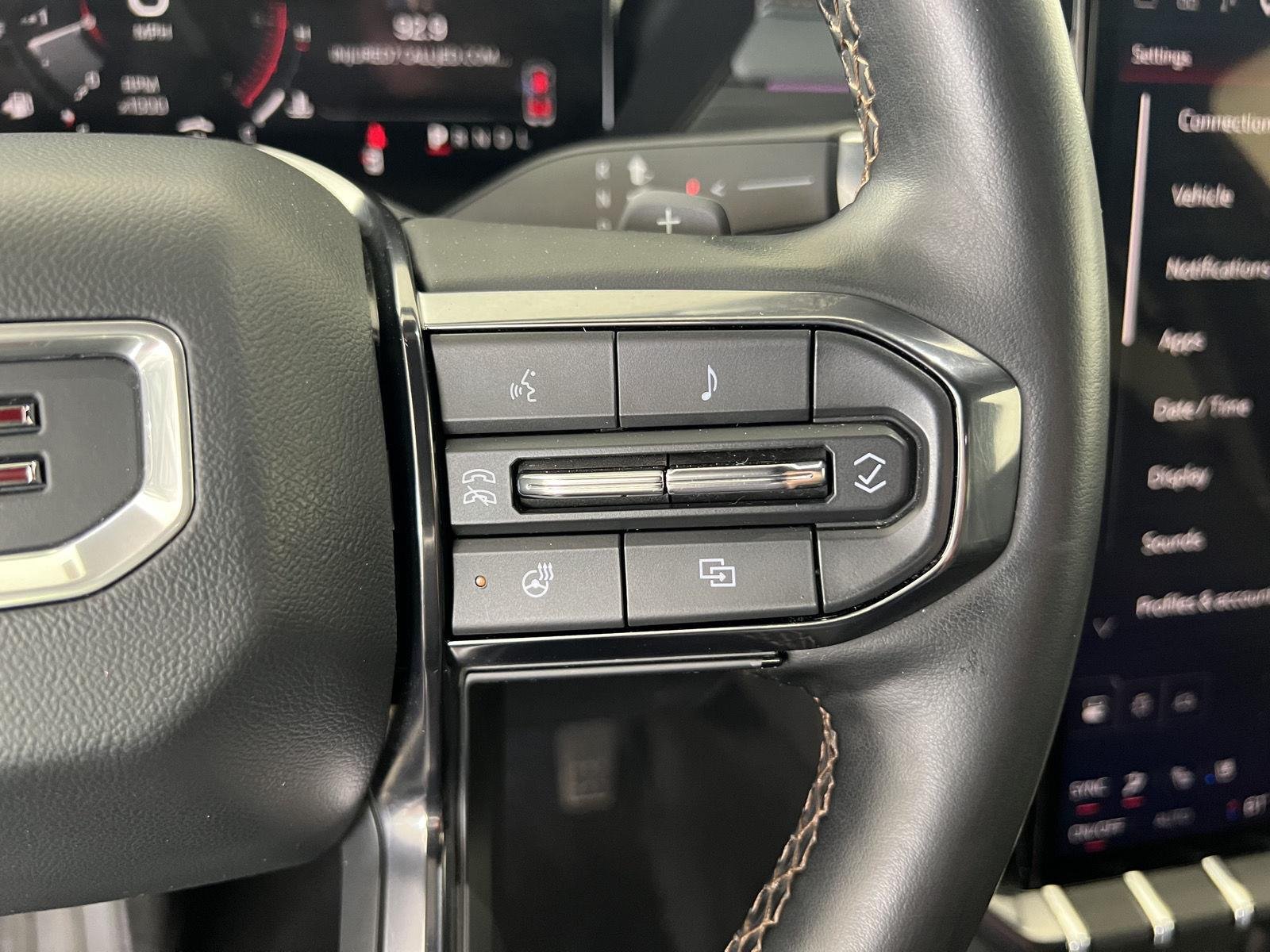 Used 2025 Ebony Twilight Metallic GMC AWD AT4 image 11
