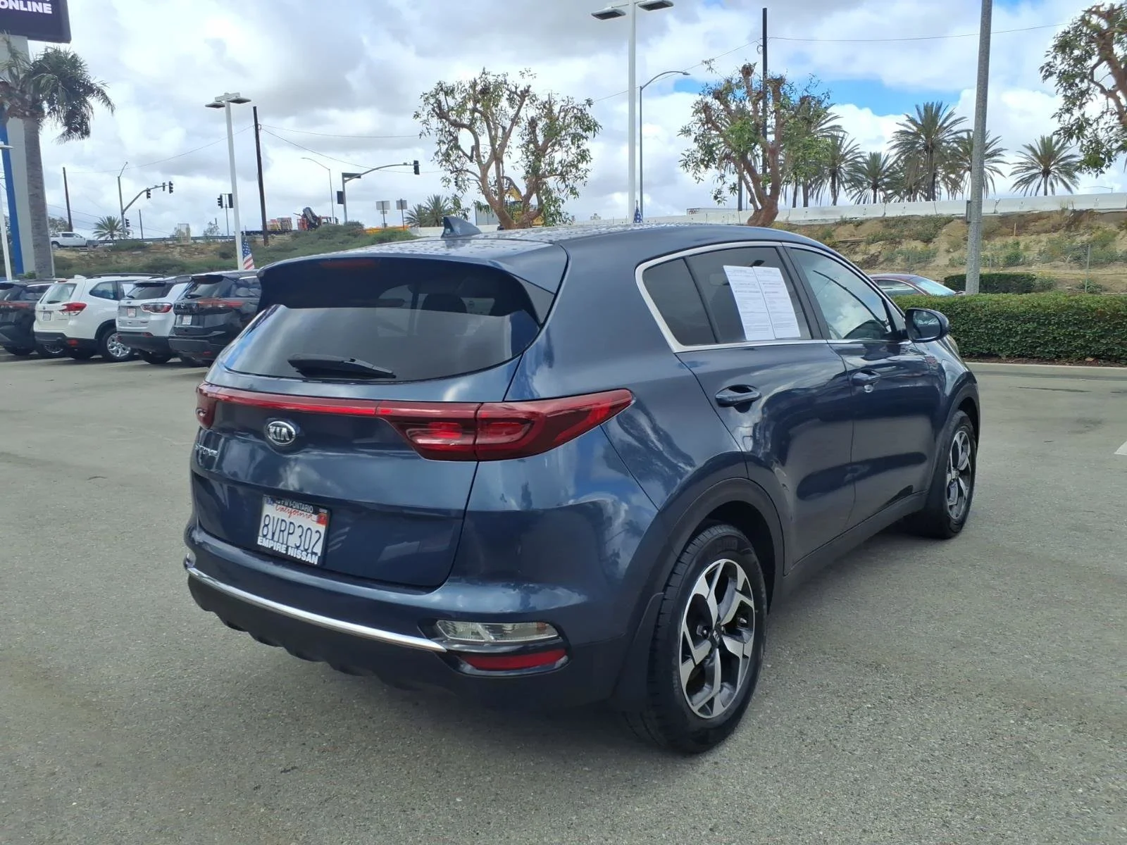 Used 2021 Pacific Blue Kia LX image 7