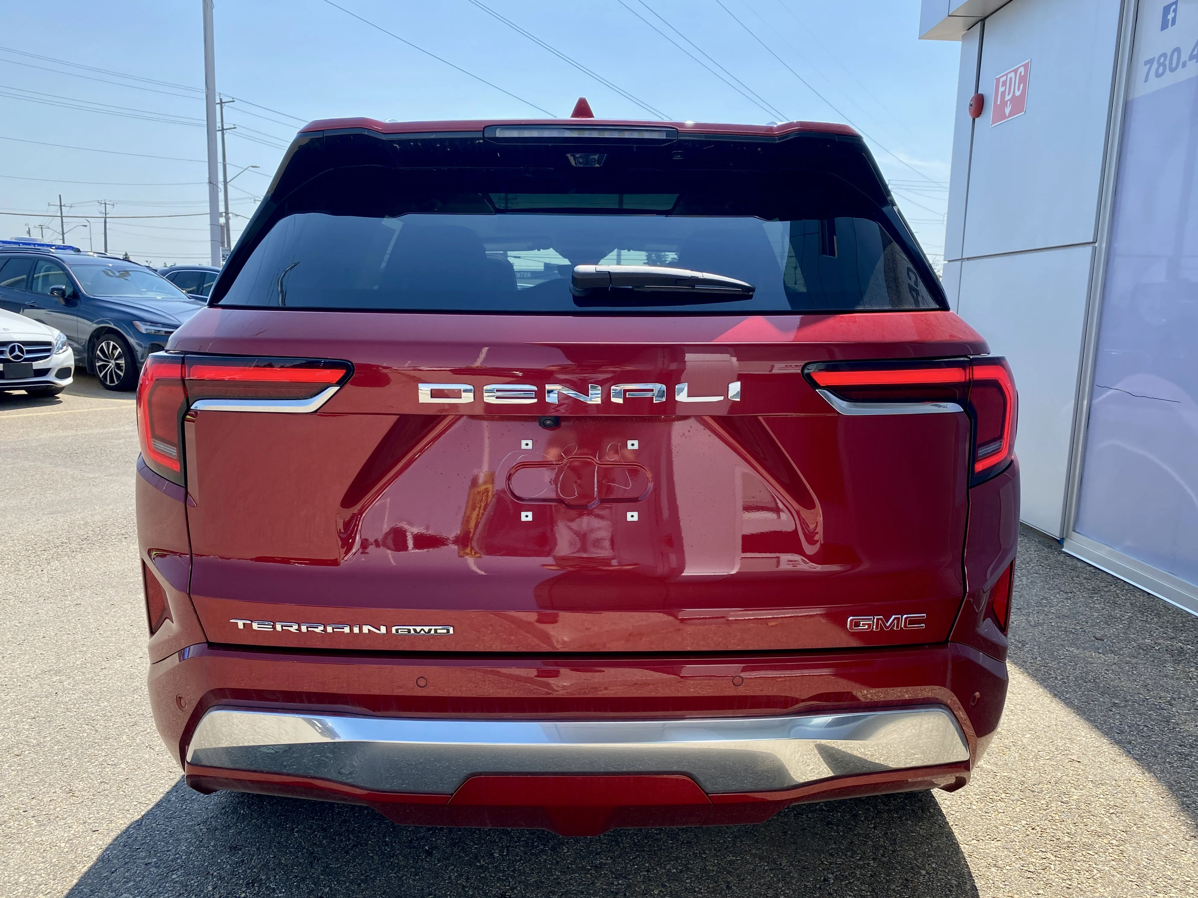 New 2026 VOLCANIC RED TINTCOAT GMC AWD Denali image 5