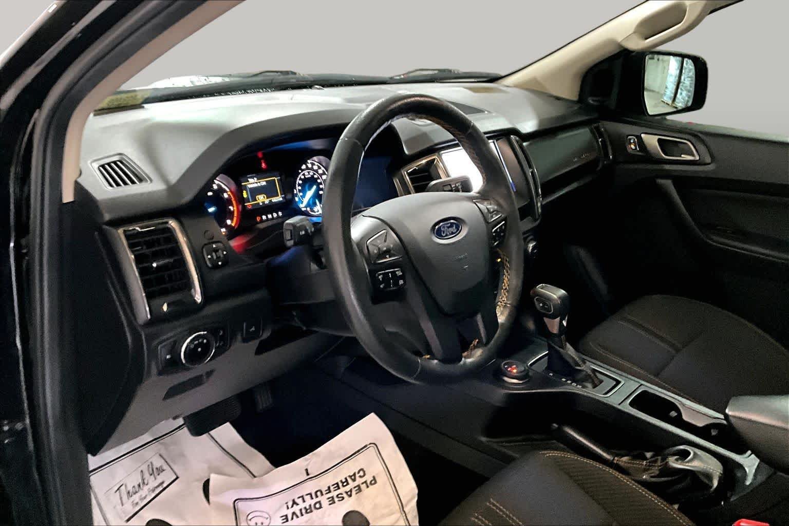 Used 2023 Shadow Black Ford XLT image 17