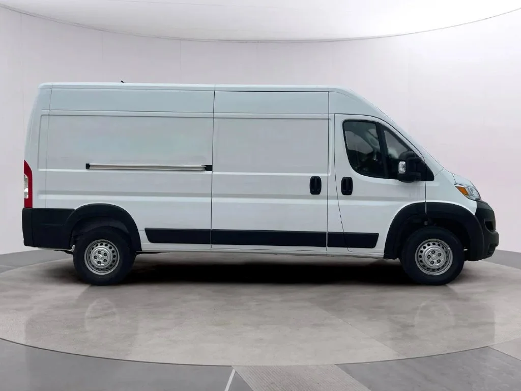 Used 2025 Bright White Clearcoat Ram High Roof image 6