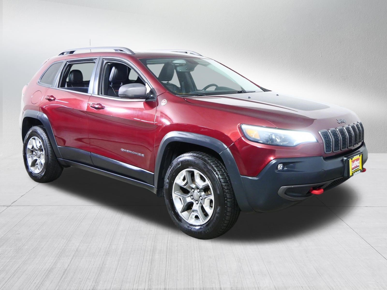 Used 2019 Velvet Red Pearlcoat Jeep Trailhawk image 1