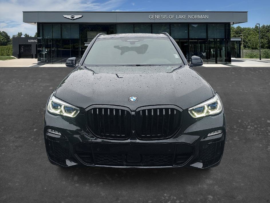 Used 2021 Black Sapphire Metallic BMW M50i image 2