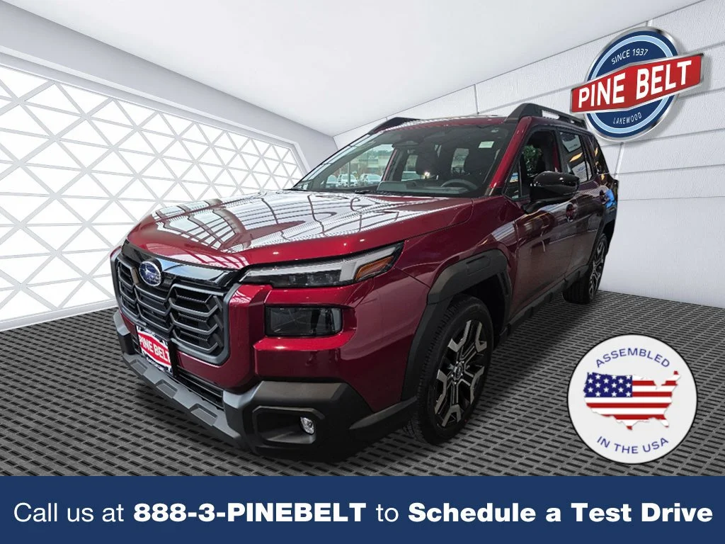 Used 2026 Crimson Red Pearl Subaru Touring XT image 1