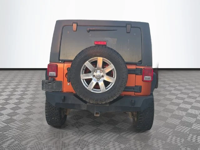 Used 2011 Orange Jeep Unlimited Rubicon image 3