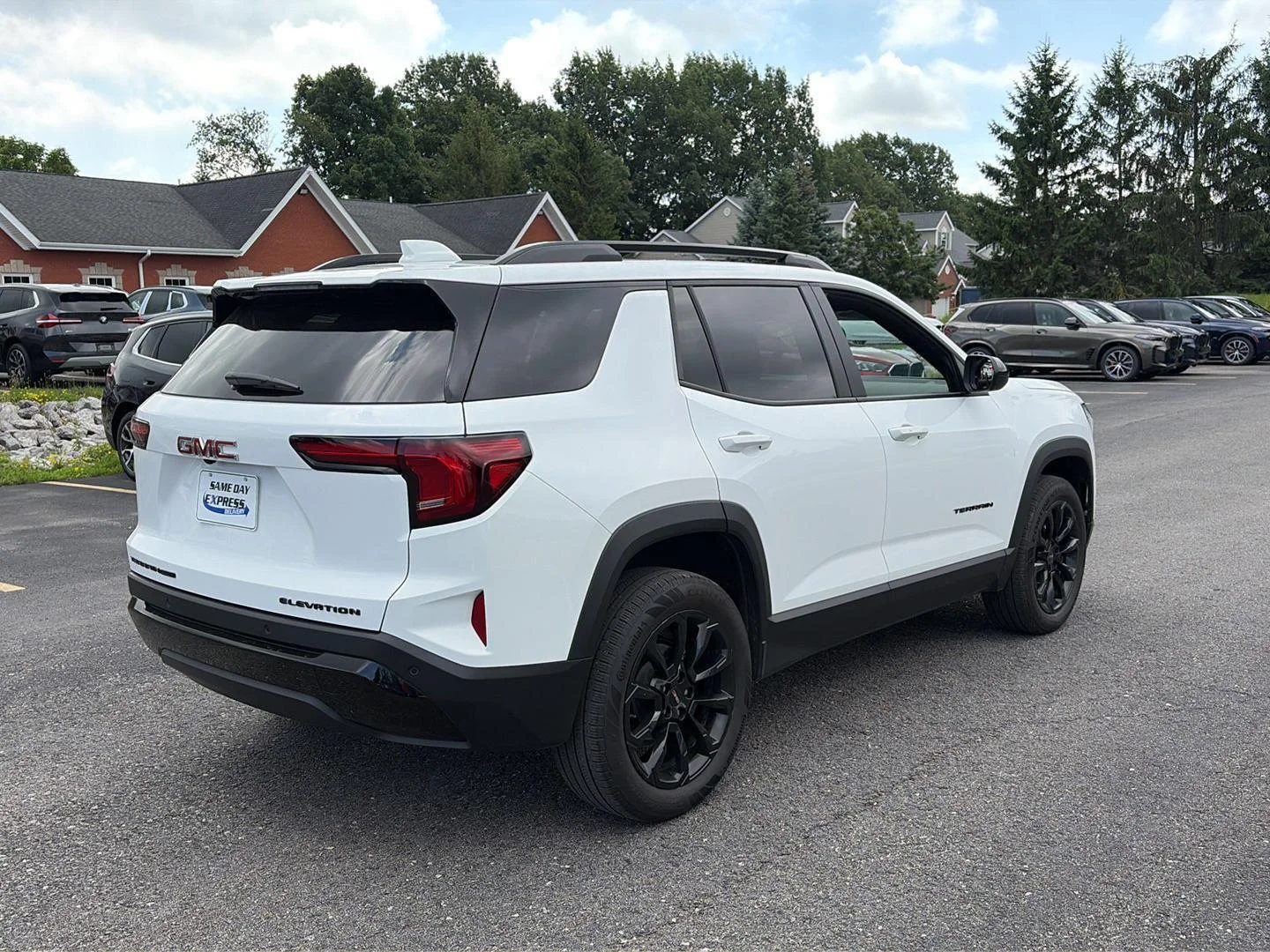 Used 2026 Summit White GMC AWD Elevation image 4