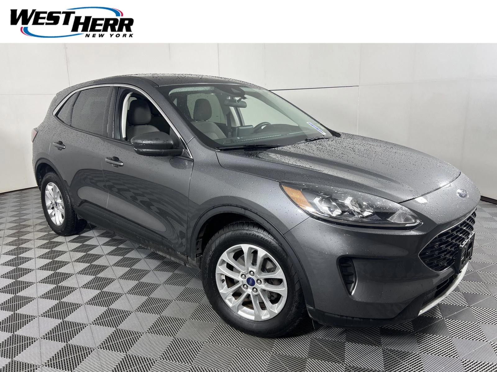 Used 2022 Carbonized Gray Ford SE image 1