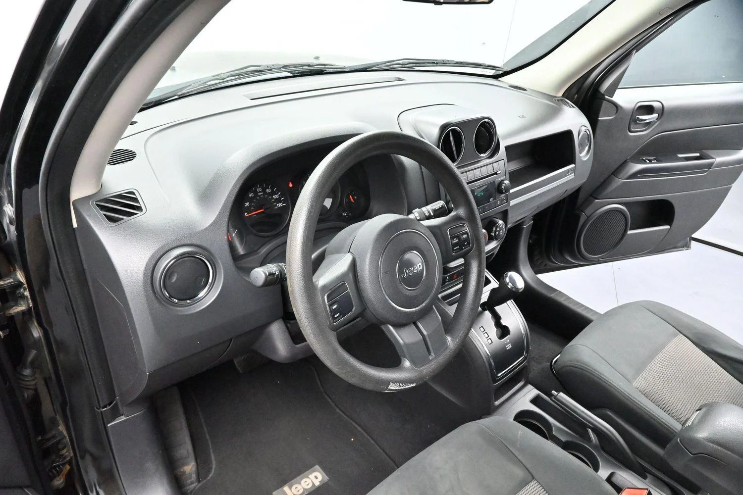 Used 2011 Brilliant Black Crystal Pearl Jeep Sport image 12