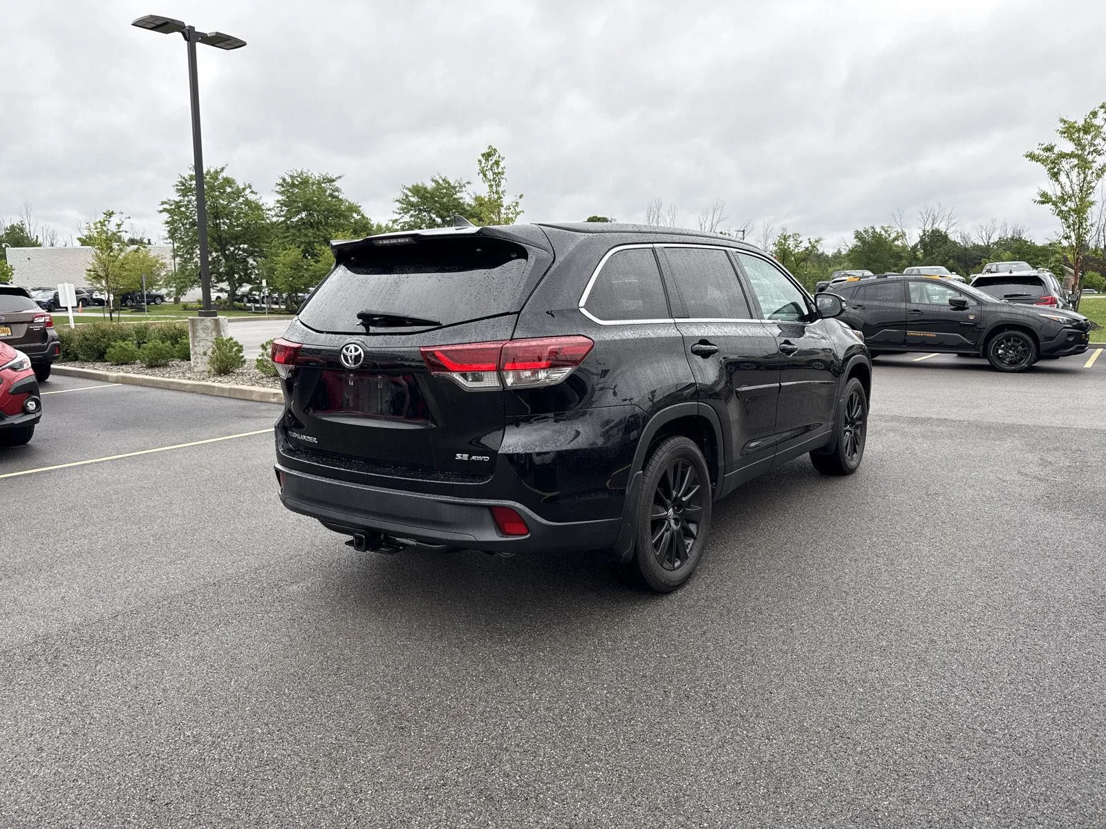 Used 2019 Midnight Black Metallic Toyota SE image 4