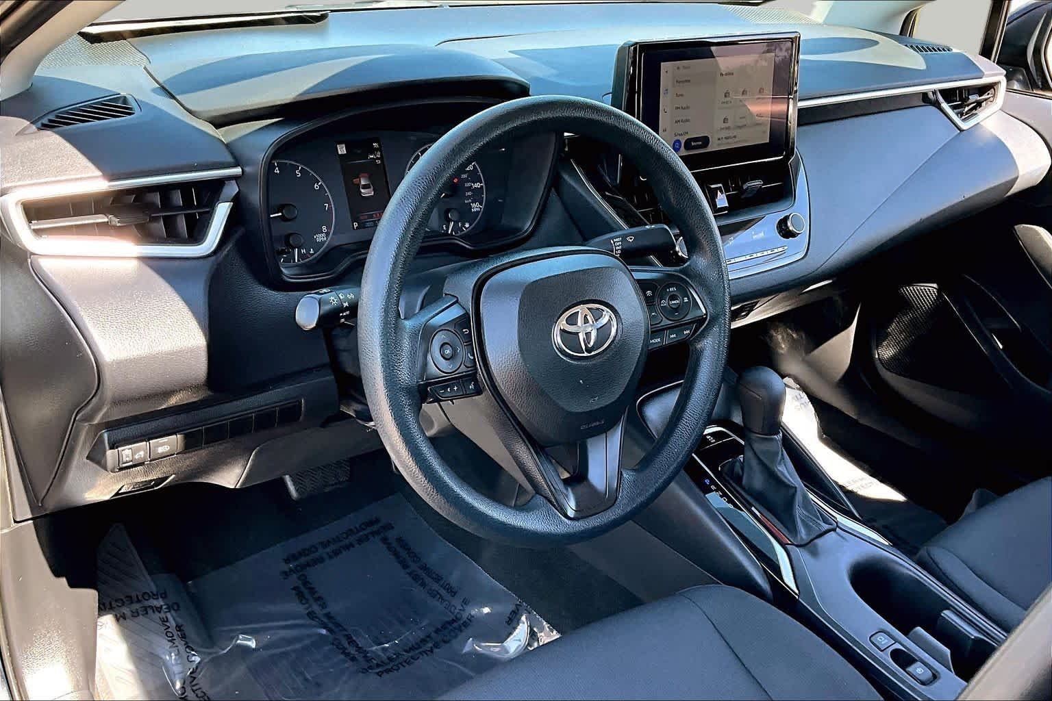 Used 2023 Midnight Black Metallic Toyota LE image 17