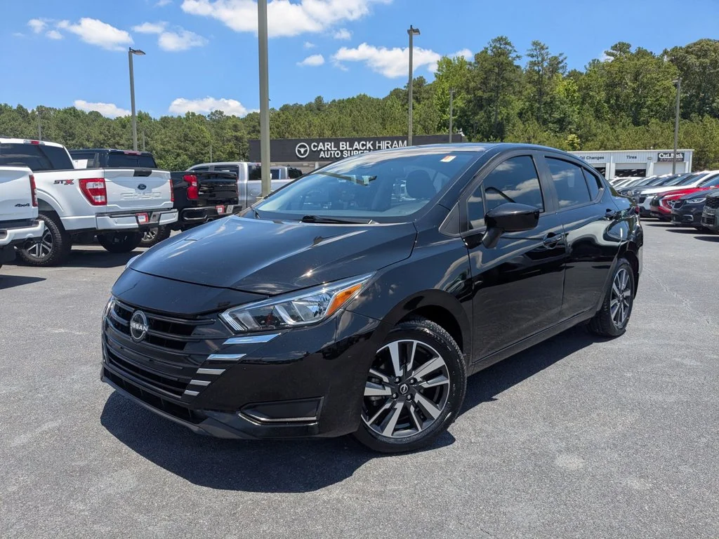 Used 2024 Super Black Nissan SV image 1