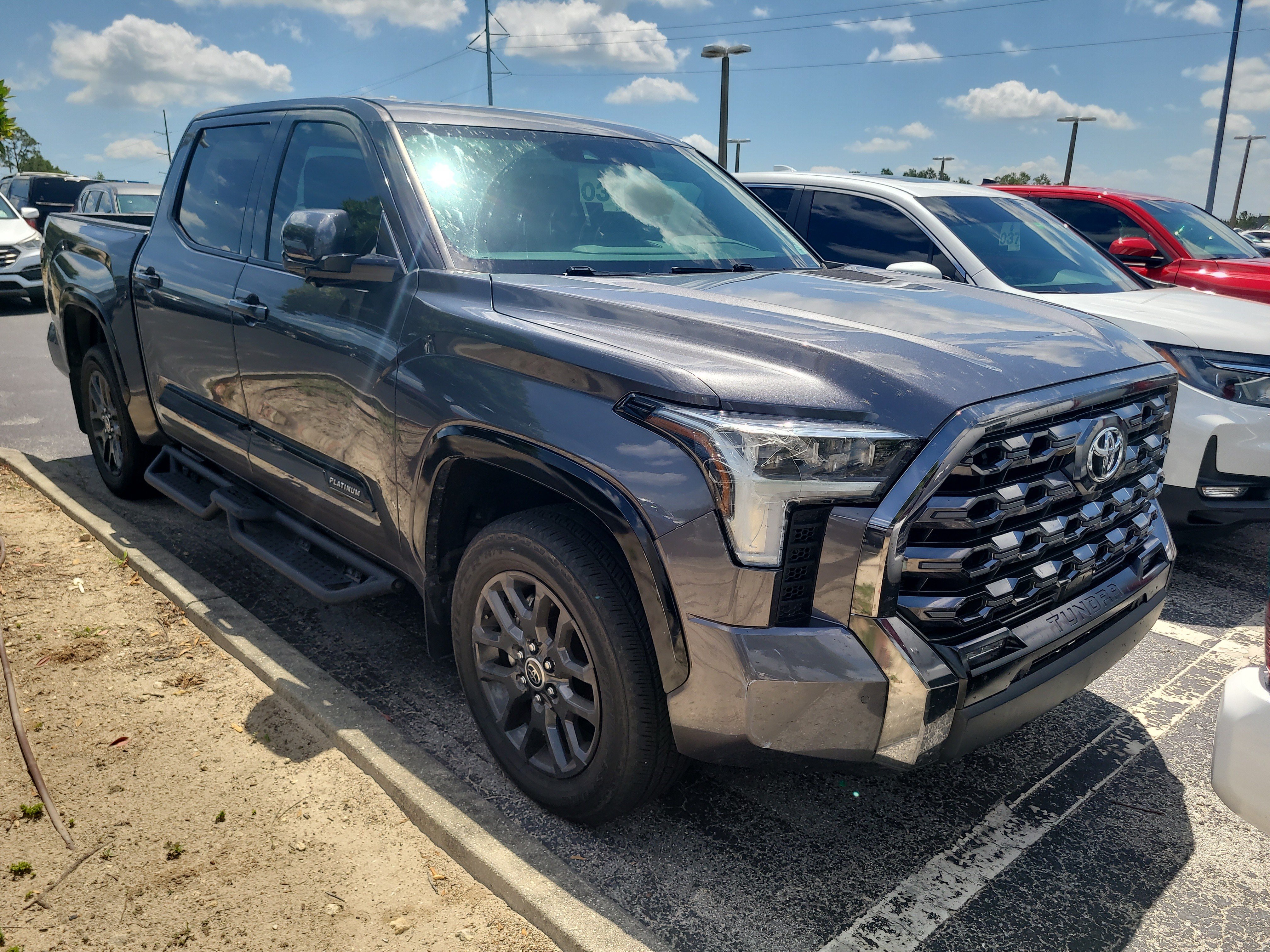 Used 2023 Magnetic Gray Metallic Toyota Platinum image 1
