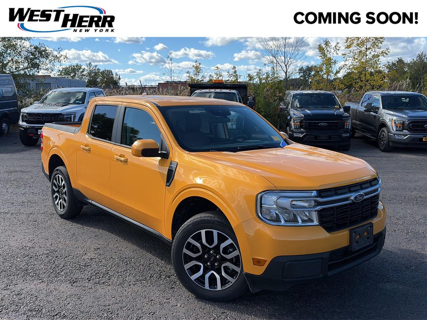 Used 2023 Cyber Orange Metallic Tri-Coat Ford LARIAT image 1