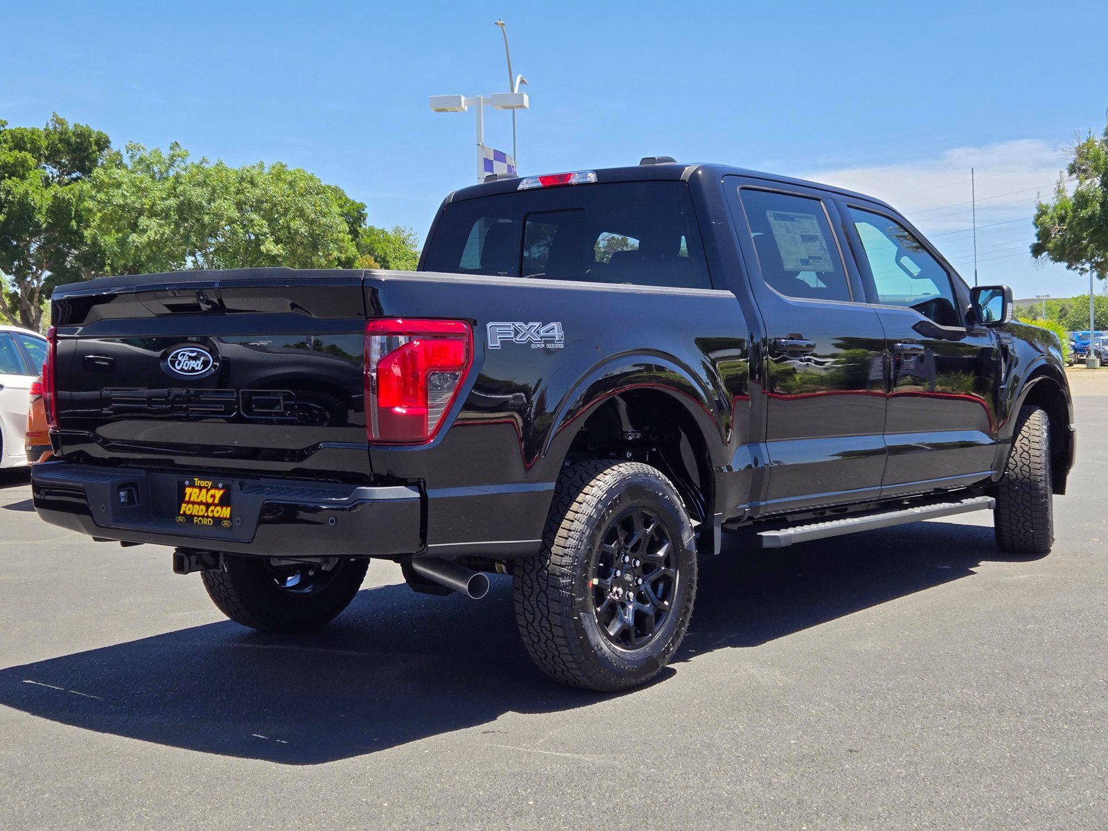 New 2026 Agate Black Metallic Ford XLT image 4