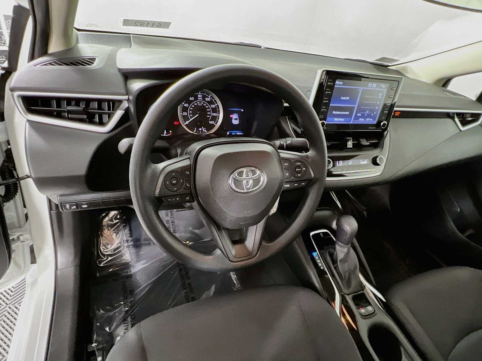 Used 2021 Super White Toyota LE image 11