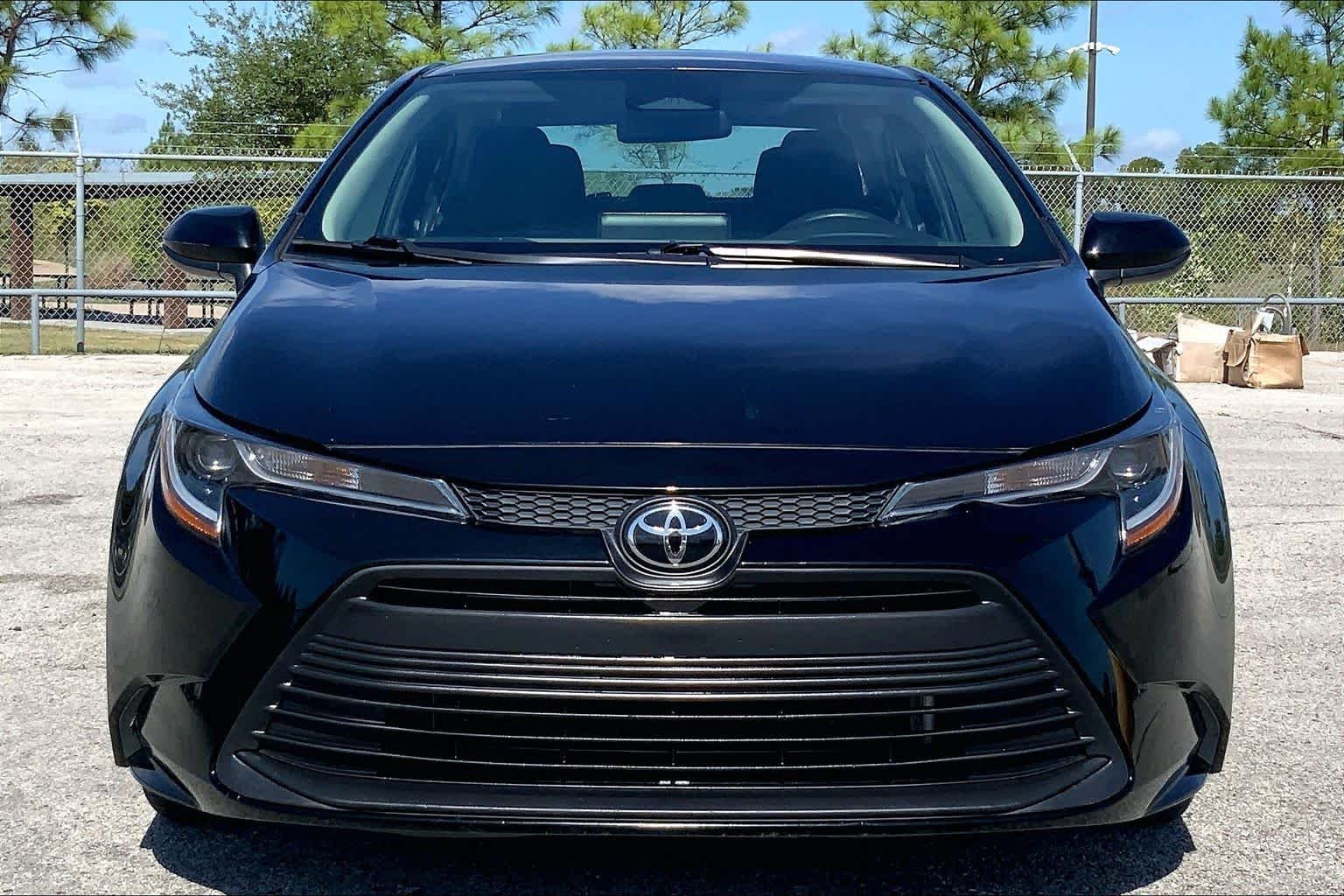 Used 2024 Midnight Black Metallic Toyota LE image 4