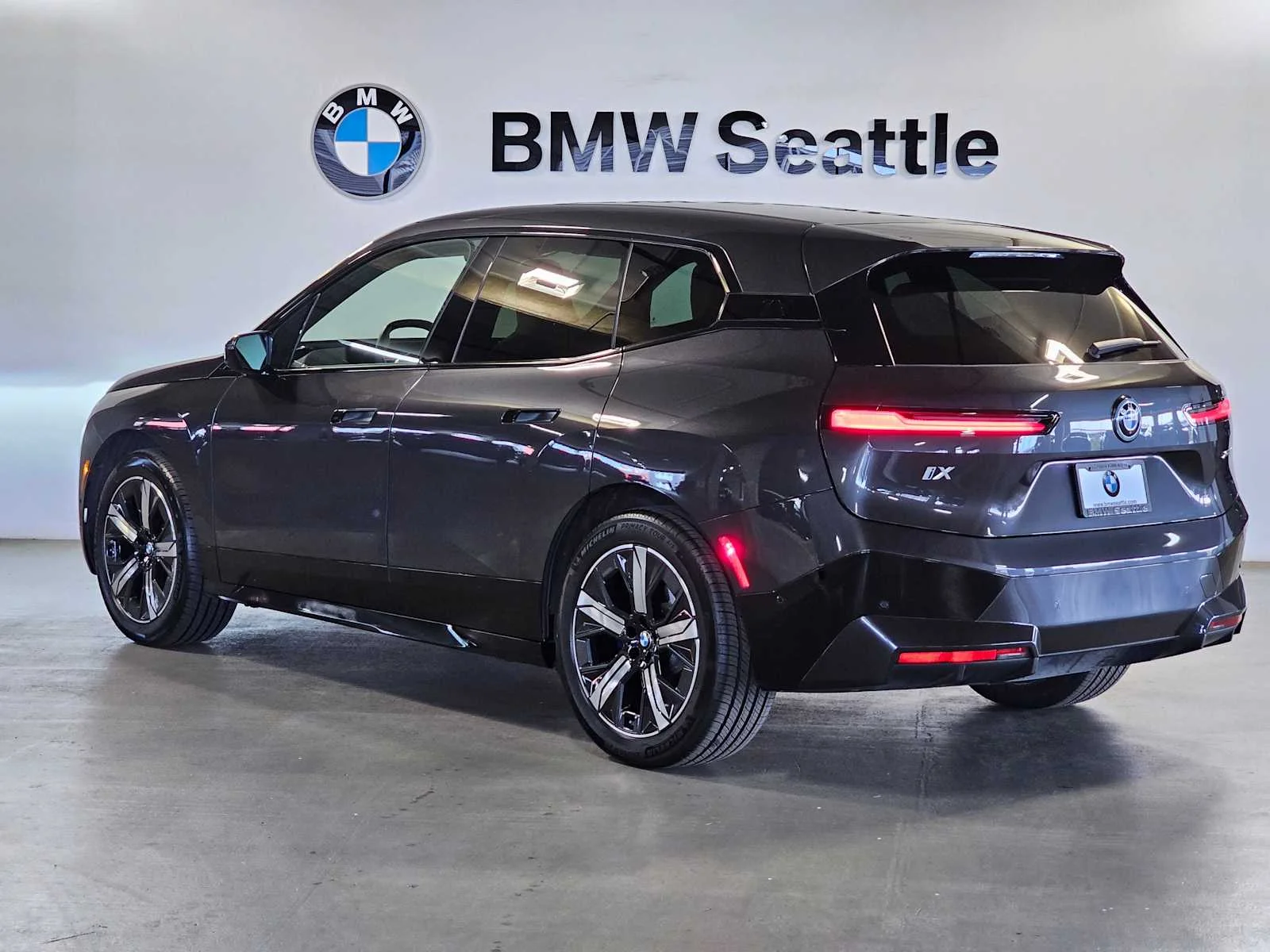 Certified Used 2024 Dark Graphite Metallic BMW xDrive50 image 4