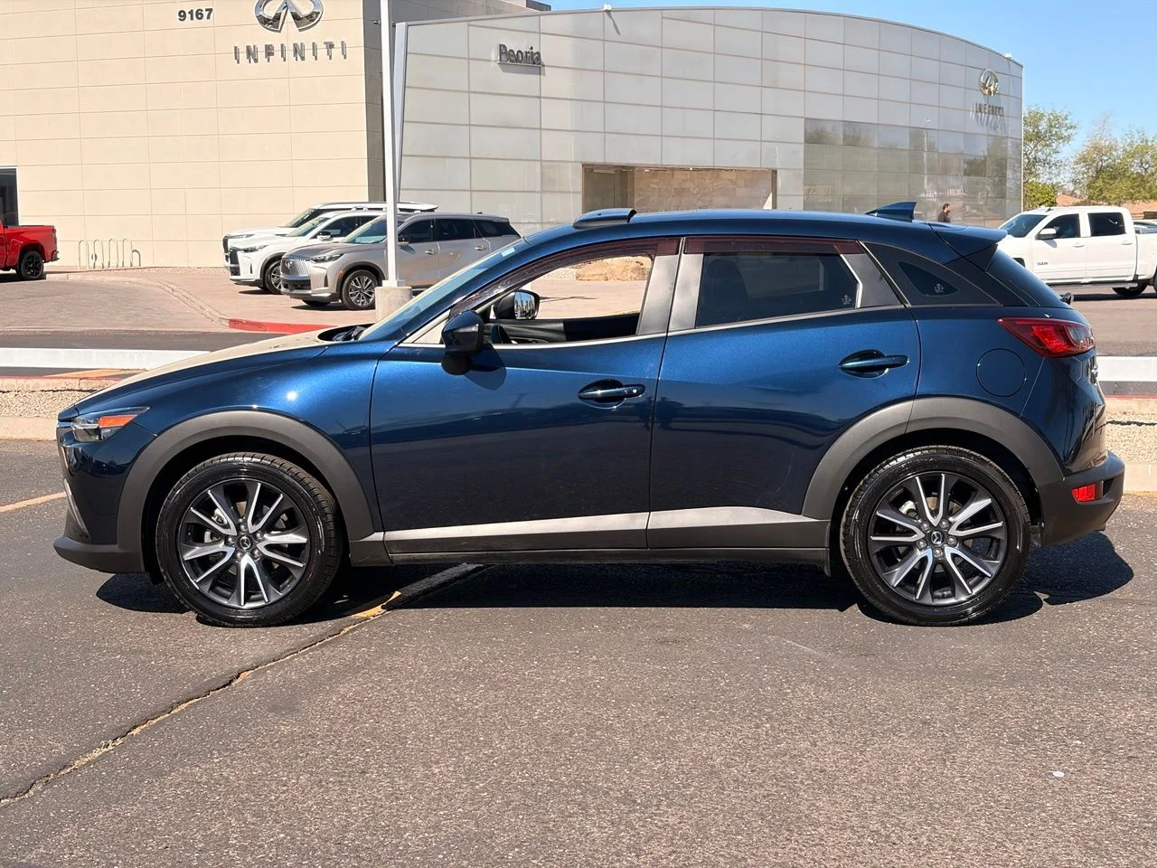 Used 2018 Deep Crystal Blue Mica Mazda Touring image 2