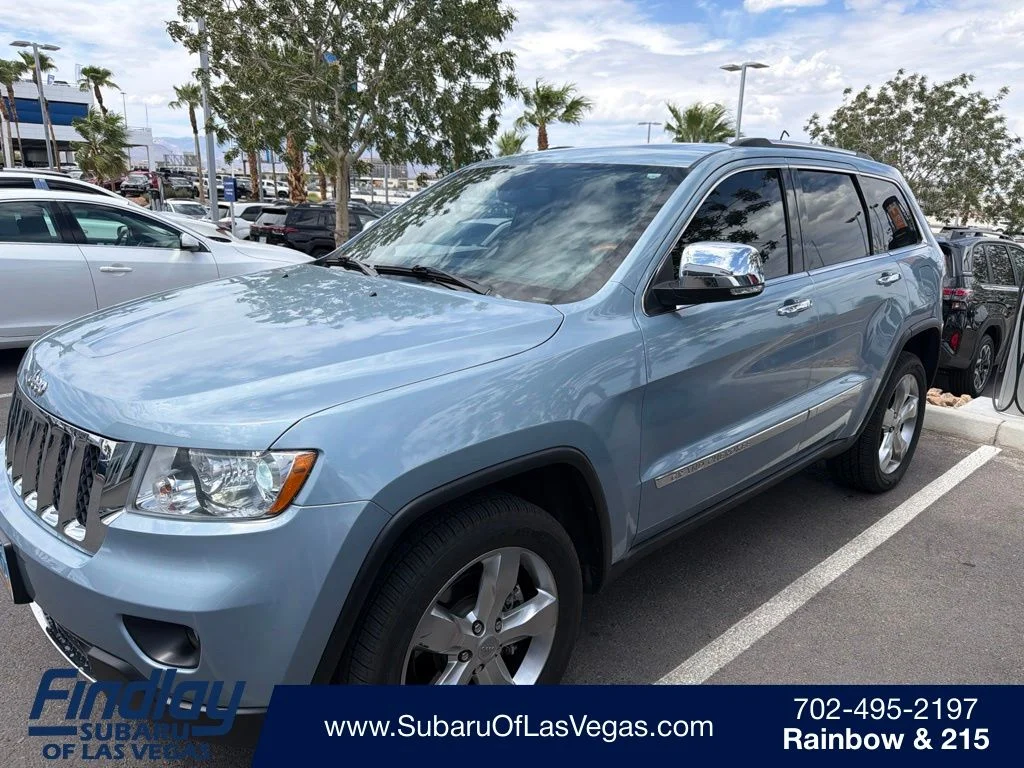 Used 2013 Beige Jeep Overland image 1