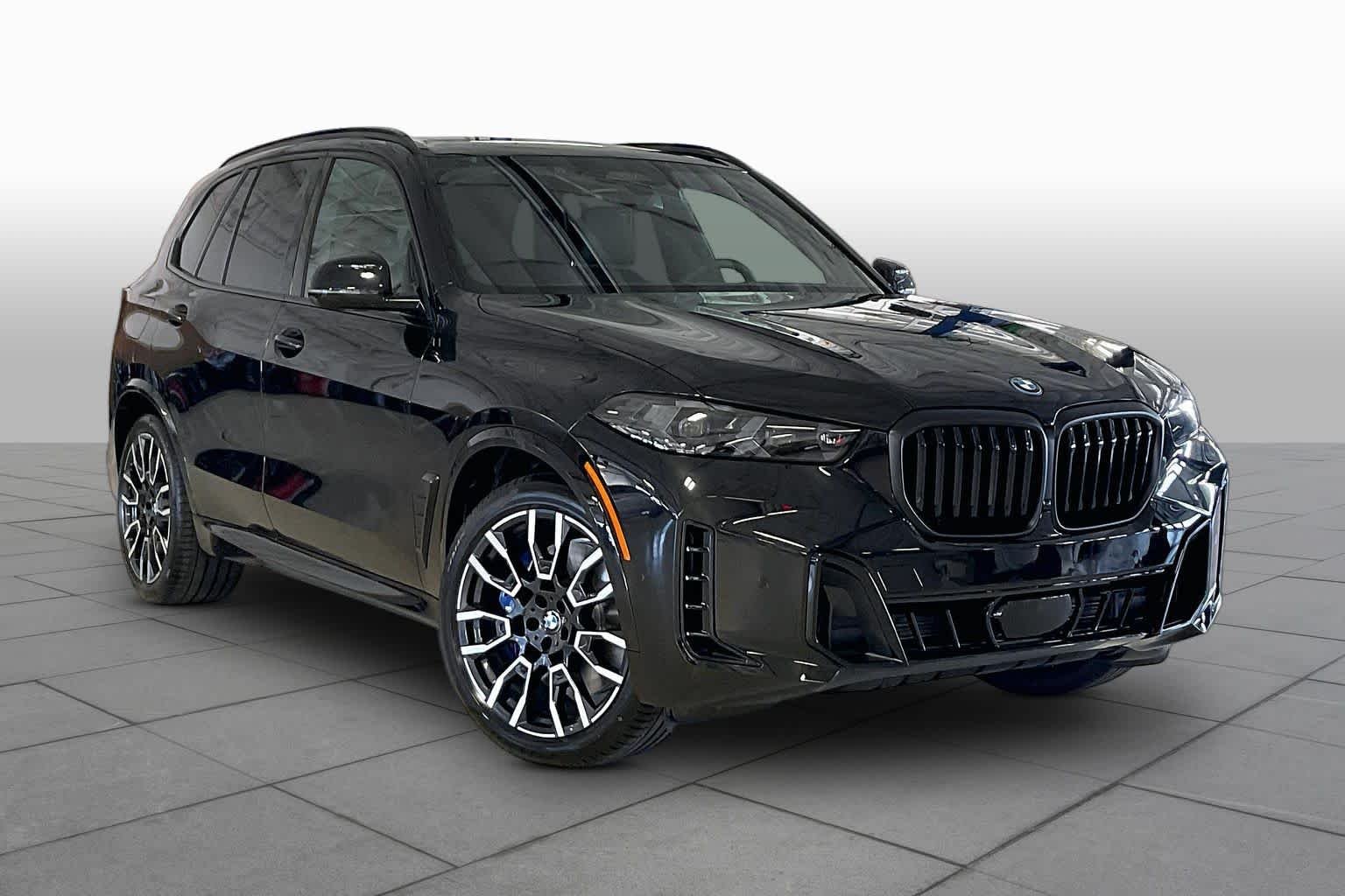 New 2026 Black Sapphire Metallic BMW xDrive50e image 2