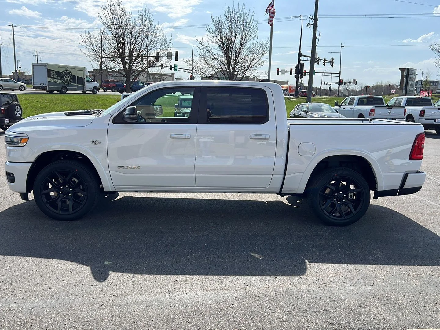 New 2026 Bright White Clear-Coat Exterior Paint RAM Laramie image 4