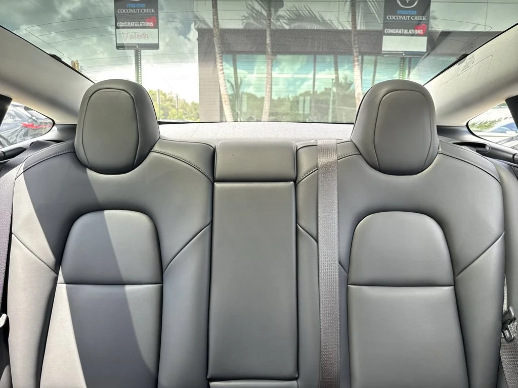 Used 2023 Solid Black Tesla  image 18