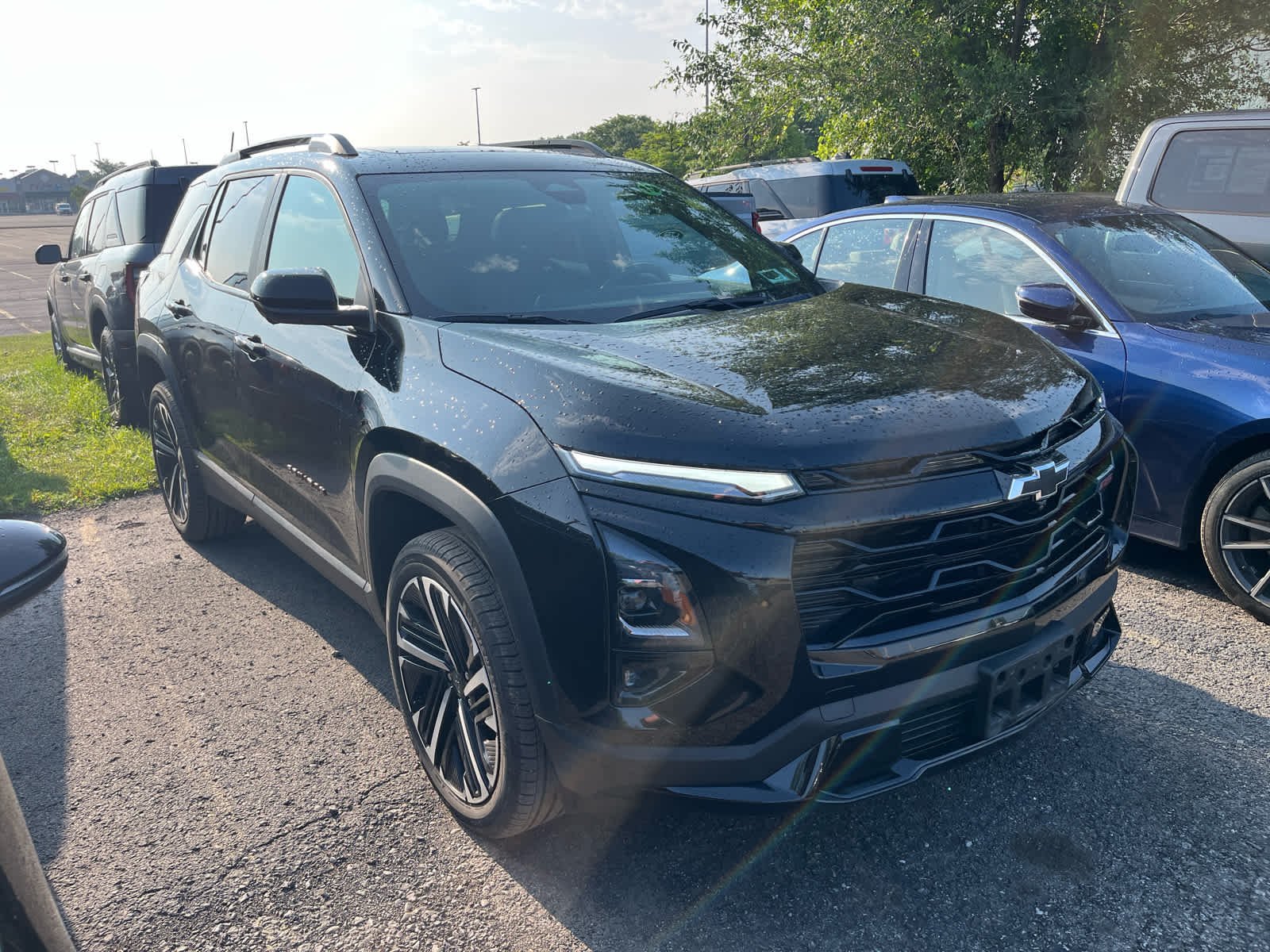 Used 2026 Mosaic Black Metallic Chevrolet AWD RS image 2