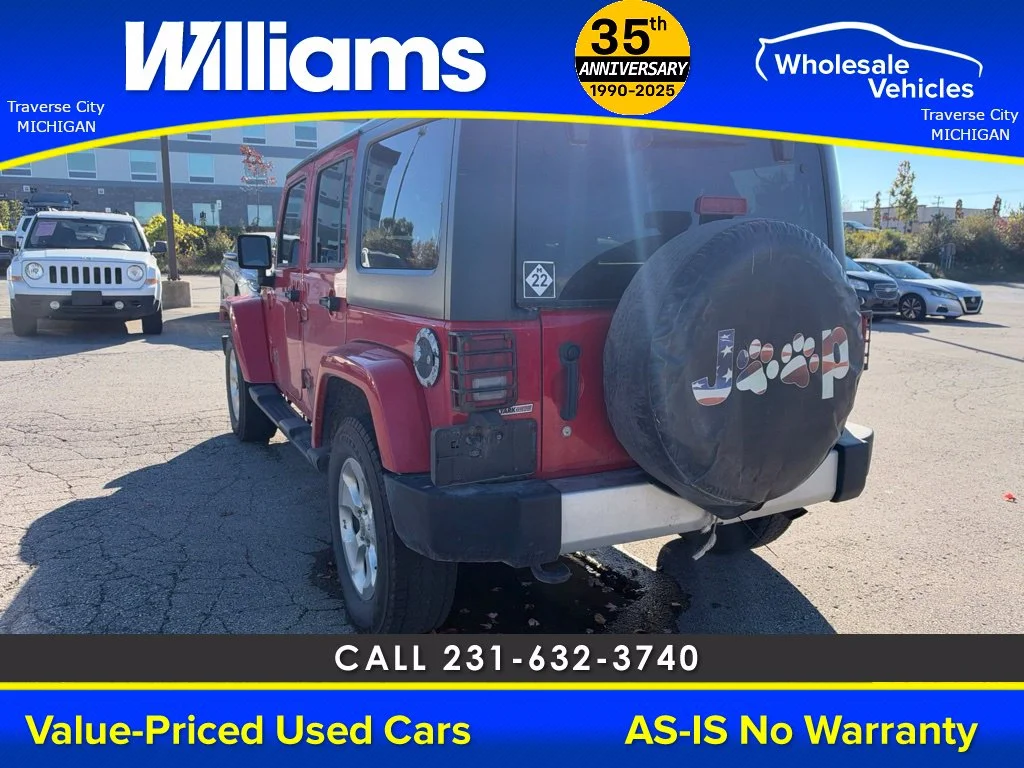 Used 2013 Flame Red Jeep Unlimited Sahara image 9