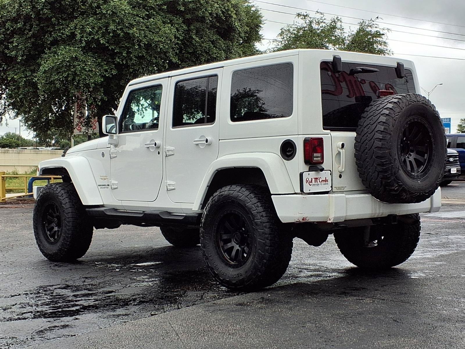 Used 2013 Bright White Jeep Sahara image 7