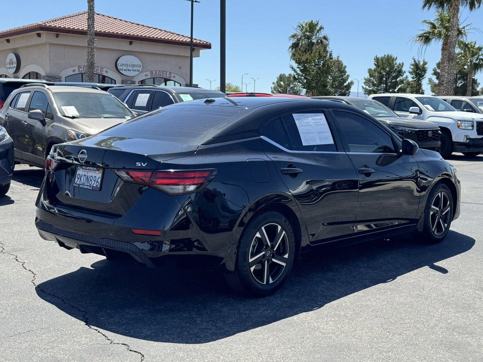 Used 2024 Super Black Nissan SV image 6
