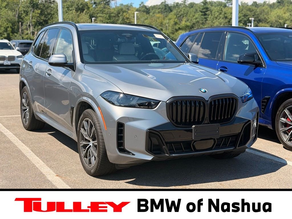 Used 2026 Skyscraper Grey Metallic BMW xDrive40i image 1