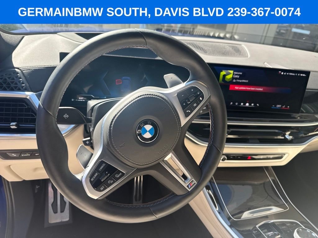 Certified Used 2026 Blue Metallic BMW M60i image 11