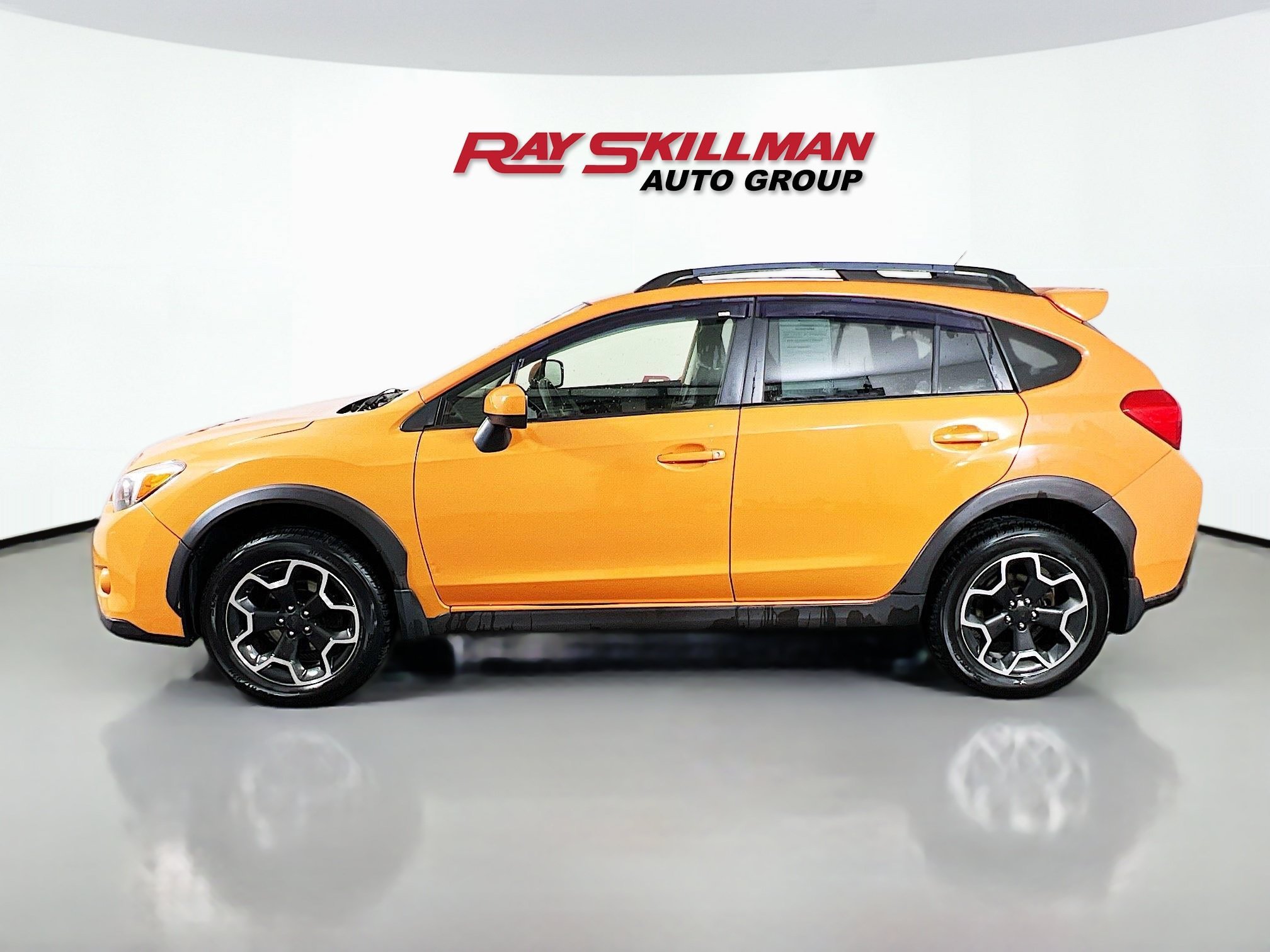 Used 2013 Tangerine Orange Pearl Subaru PREMIUM image 2