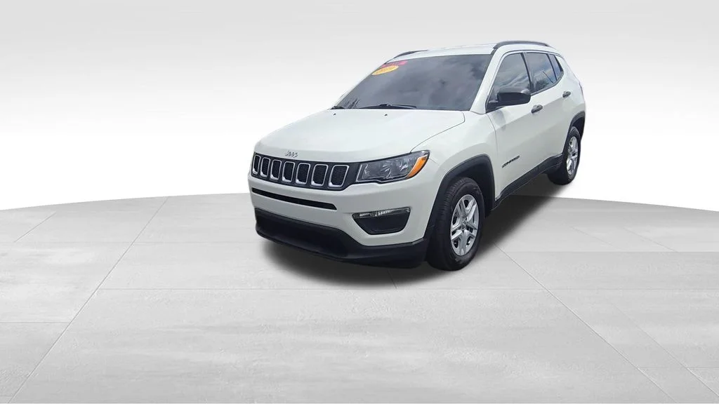 Used 2019 White Clearcoat Jeep Sport image 4