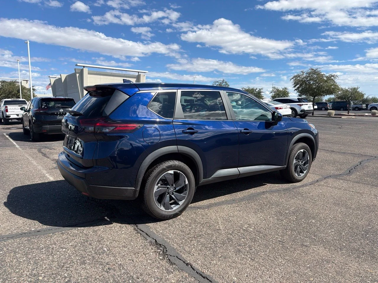 Used 2024 Deep Ocean Blue Pearl Nissan SV image 4