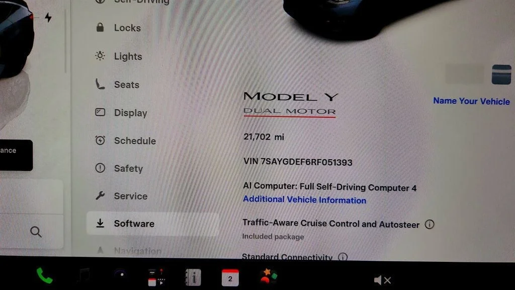 Used 2024 Stealth Grey Tesla Performance AWD w/ White & Black Interior image 14
