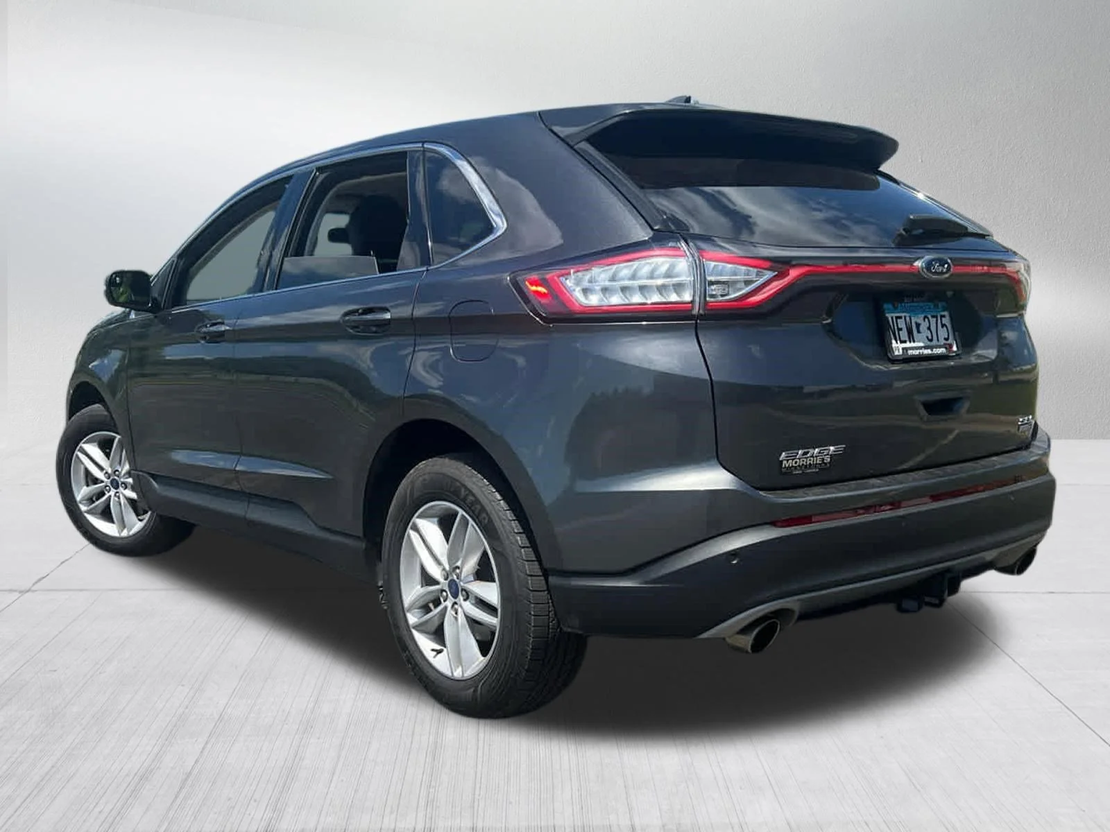 Used 2015 Magnetic Metallic Ford SEL image 5