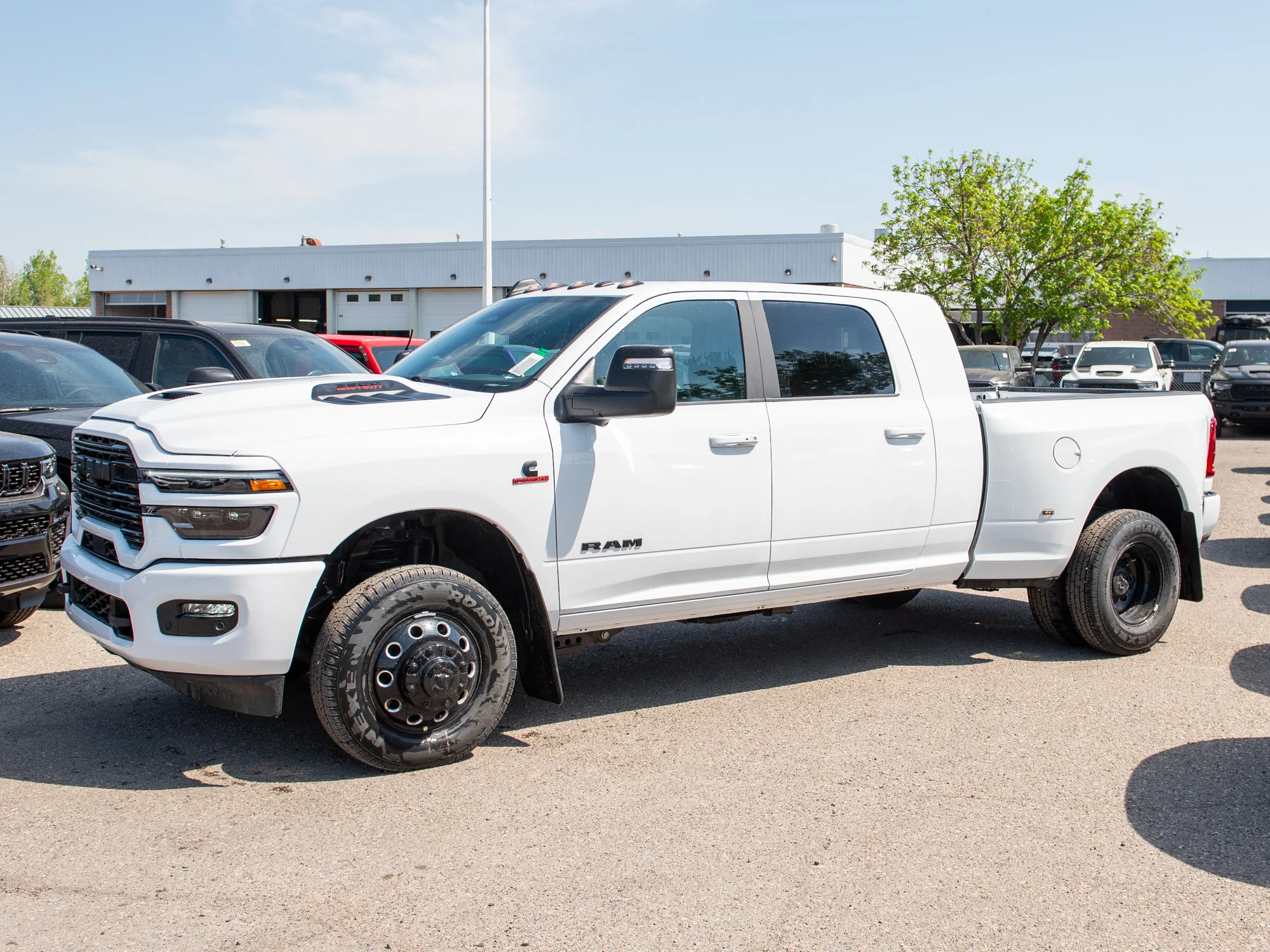 New 2026 White RAM Laramie* image 2