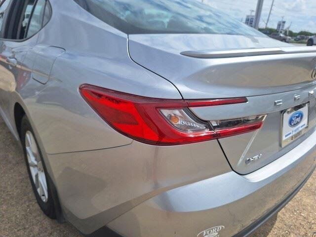 Used 2025 Celestial Silver Metallic Toyota LE image 28