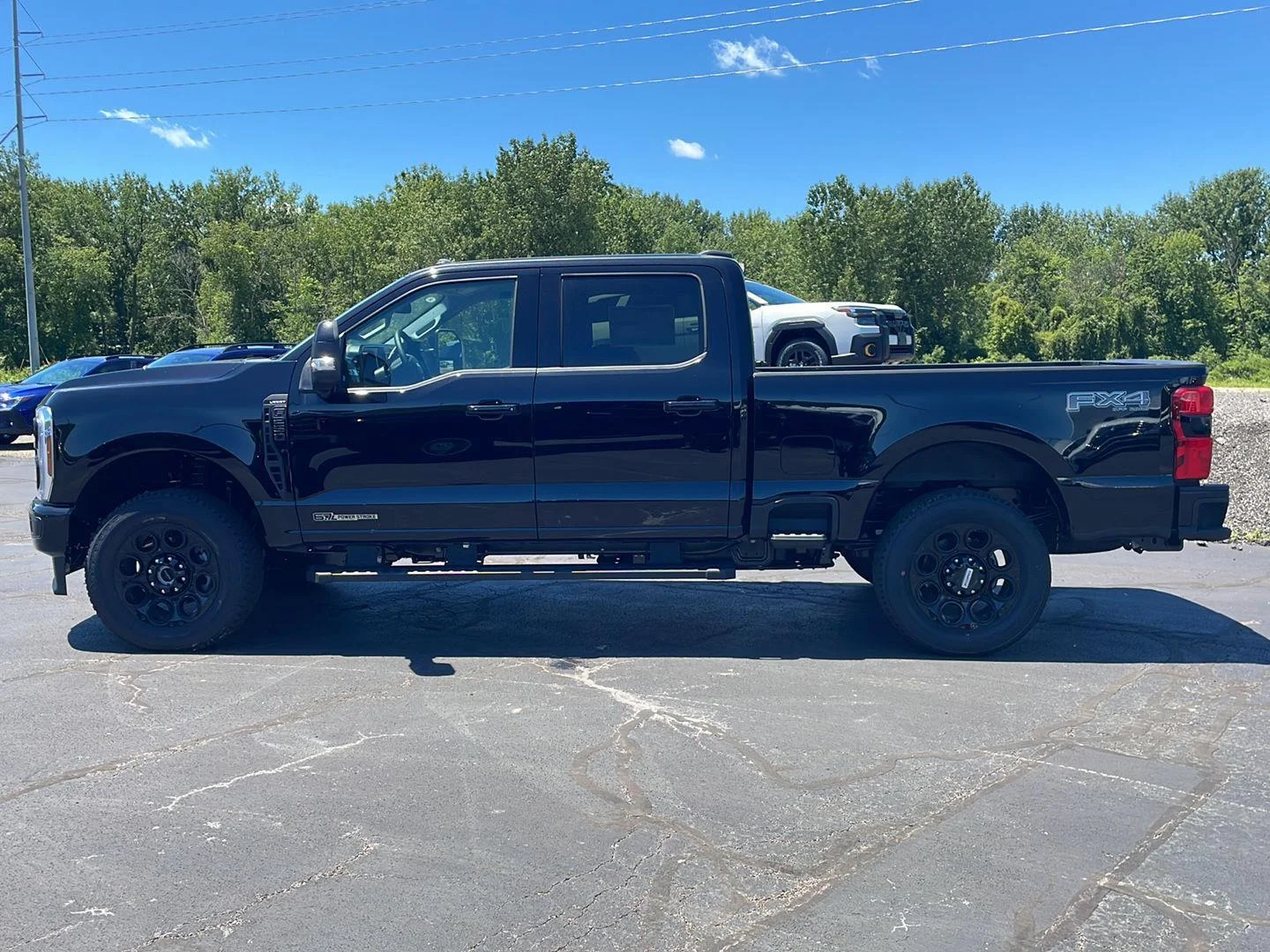 New 2026 Agate Black Metallic Ford LARIAT image 2