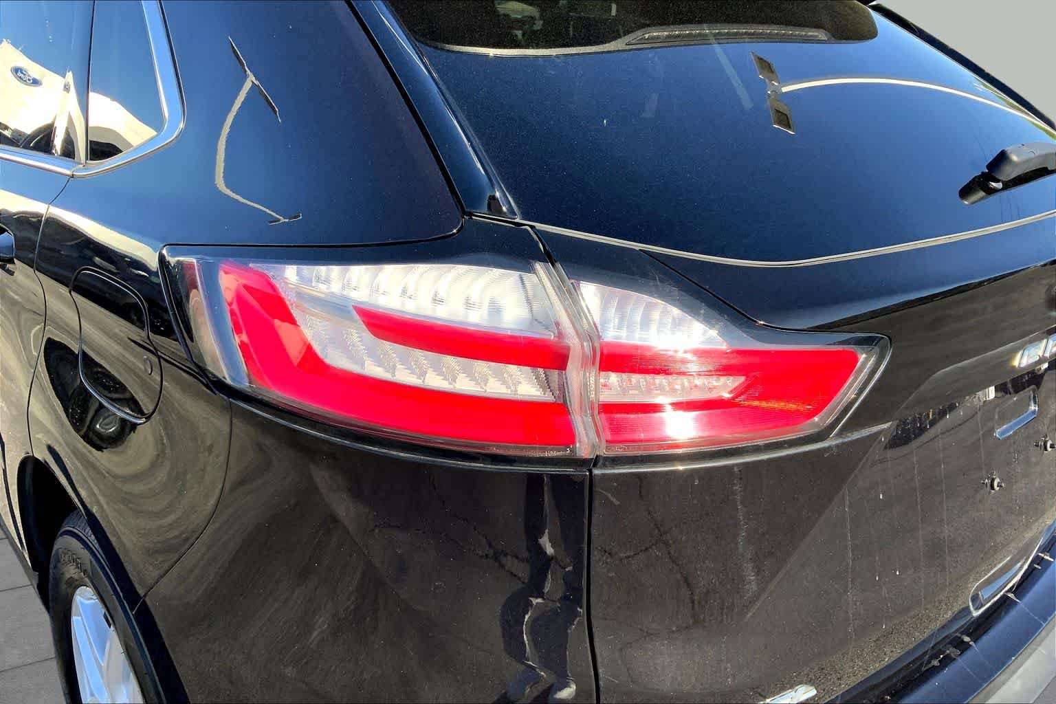Certified Used 2023 Agate Black Metallic Ford SEL image 23