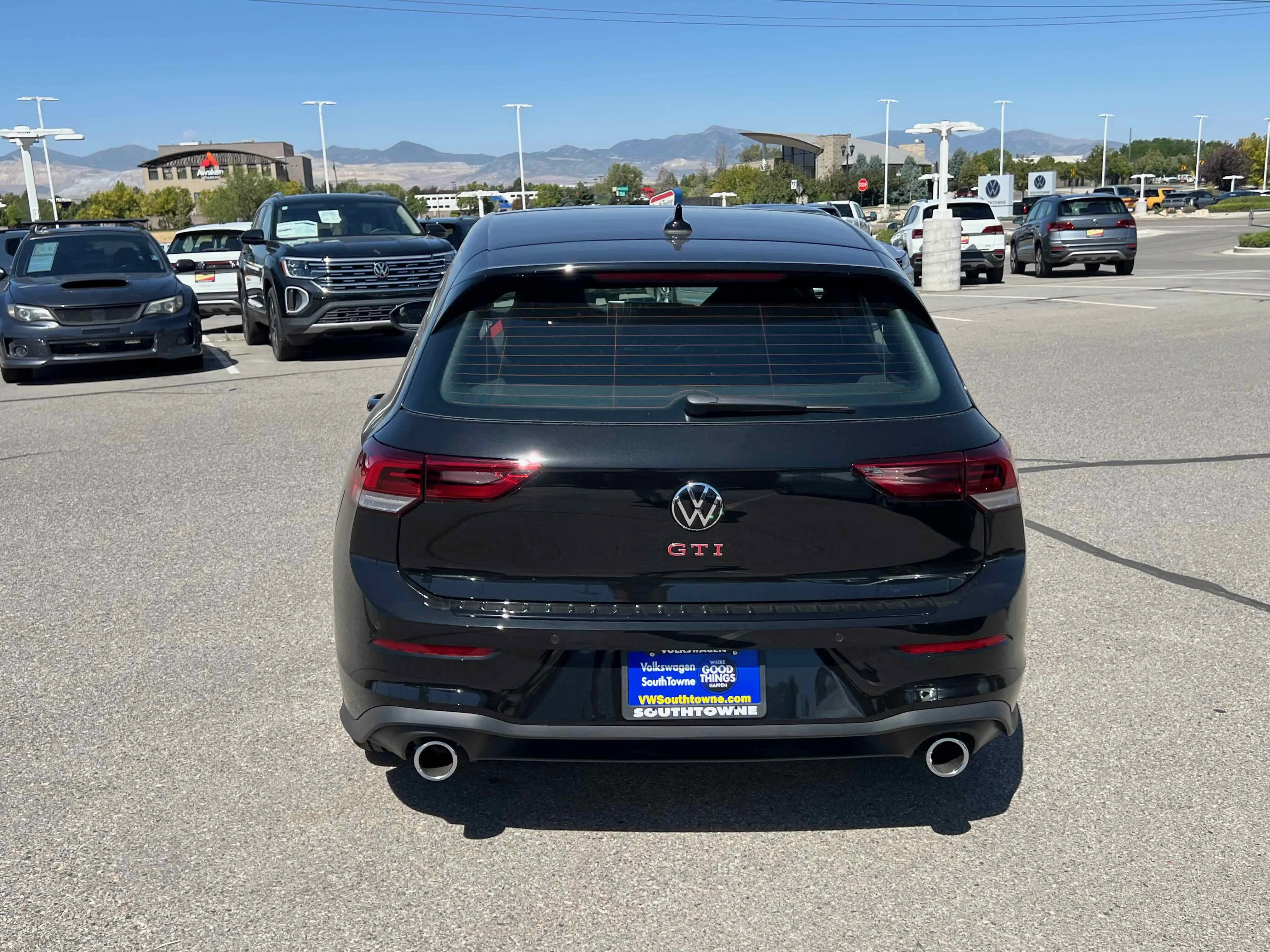 New 2025 Black Volkswagen SE image 12