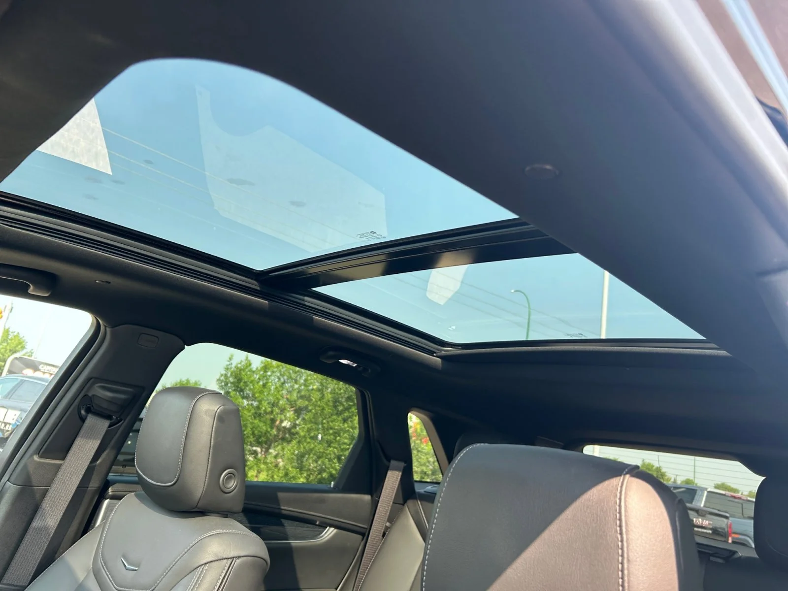 Certified Used 2025 STELLAR BLACK METALLIC Cadillac AWD Premium Luxury Leather Sunroof Nav image 18