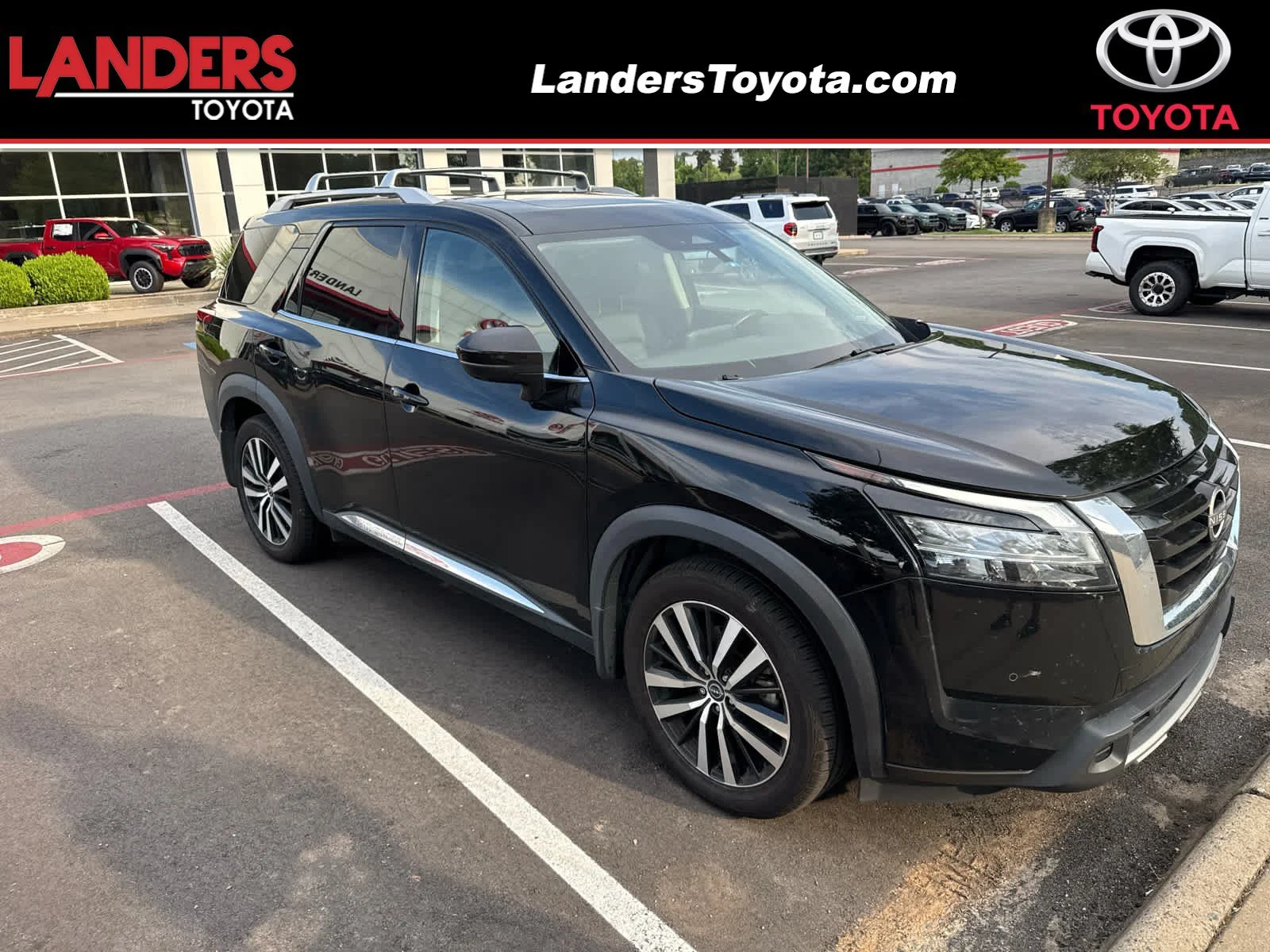 Used 2024 Super Black Nissan Platinum image 1