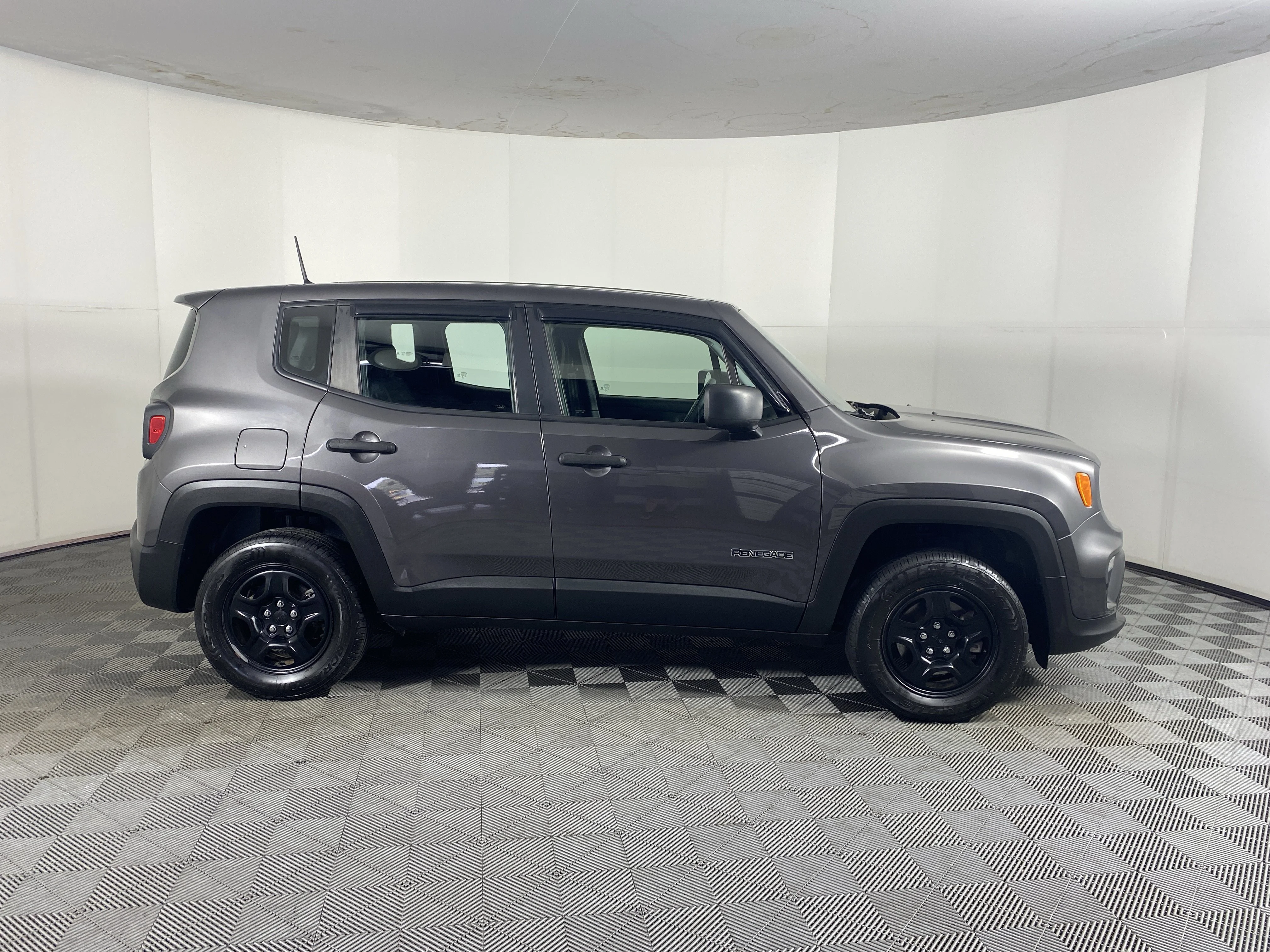 Used 2019 Granite Crystal Metallic Clearcoat Jeep Sport image 5