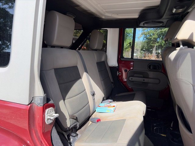 Used 2010 Red Jeep Unlimited Sahara image 17