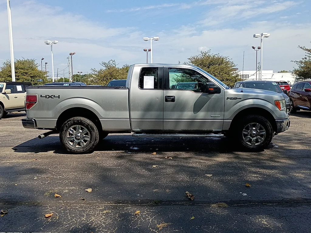 Used 2011 Ingot Silver Metallic Ford XLT image 2