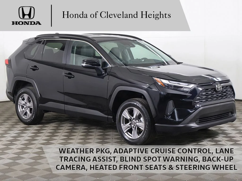 Used 2024 Midnight Black Metallic Toyota XLE image 1