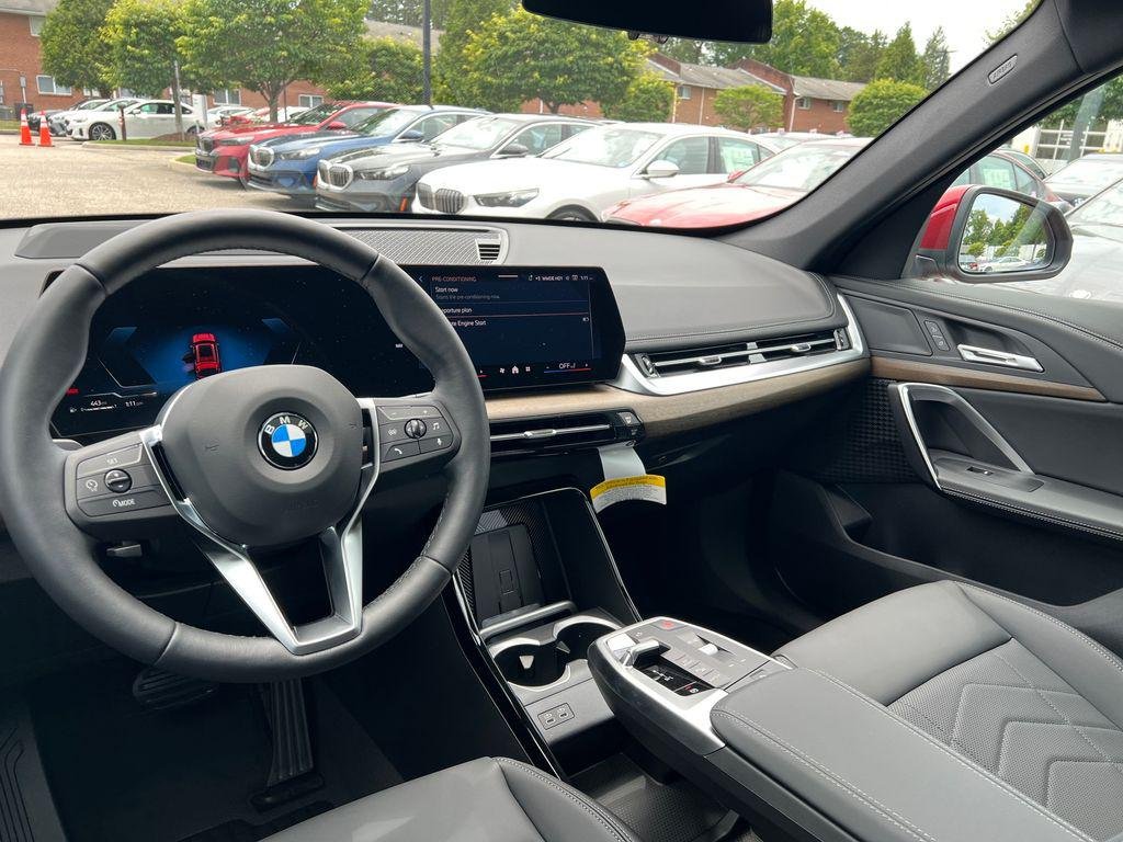 New 2026 Vegas Red Metallic BMW xDrive28i image 25